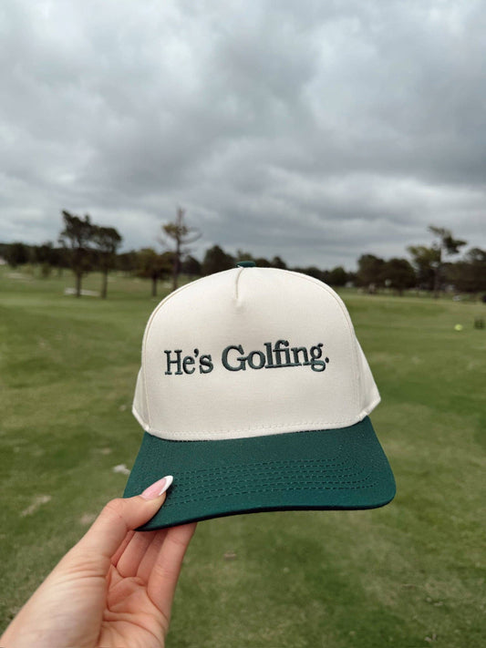 He's Golfing Vintage Trucker Hat