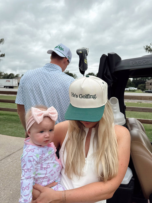 He's Golfing Vintage Trucker Hat